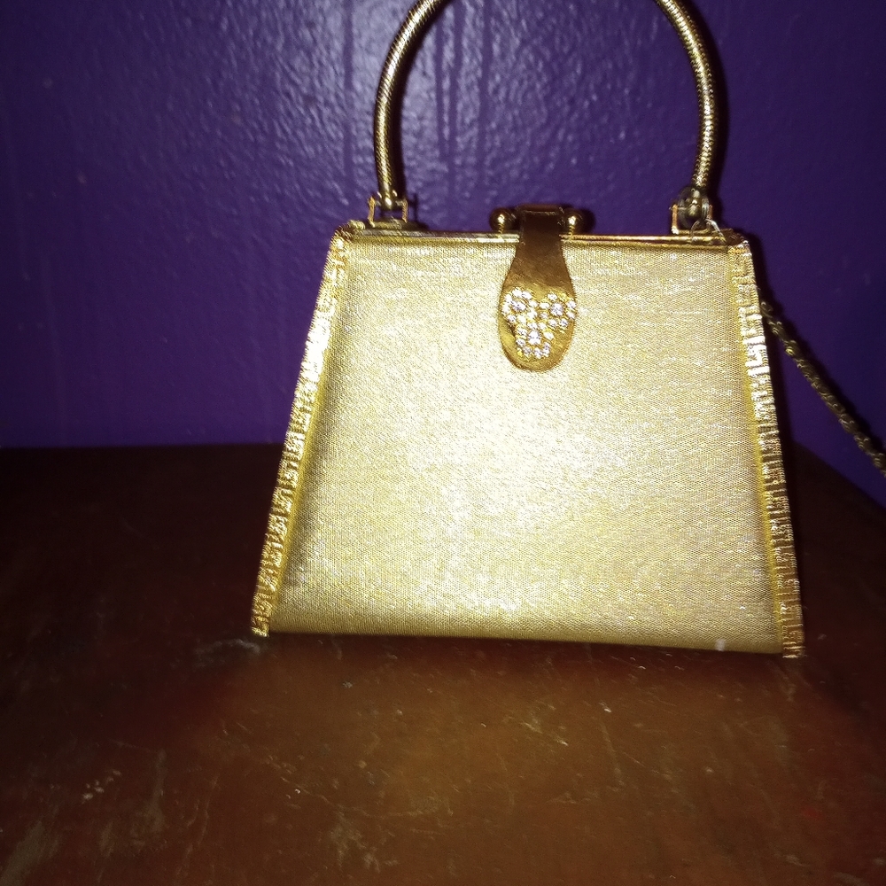 Small beautiful shimmer ring gold purse with gold chain